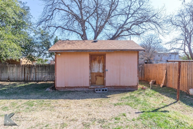 view of shed featuring a fenced backyard