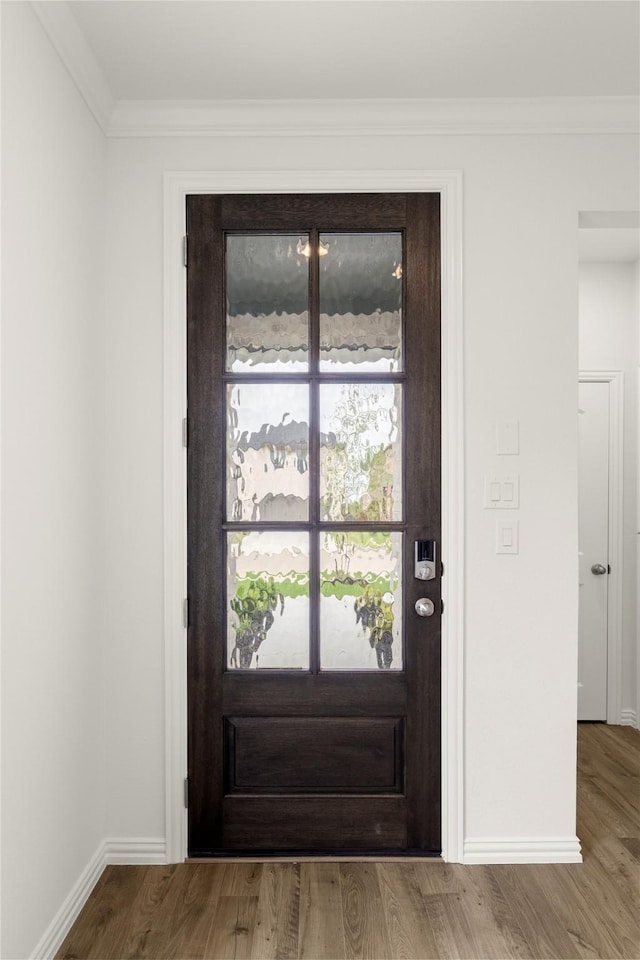 2720 Green River Rd, Royse City, TX 75189 - doorway featuring wood finished floors, ornamental molding, and baseboards