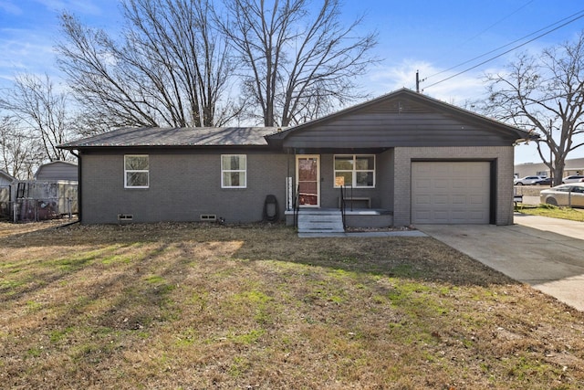 ranch-style house with brick siding, concrete driveway, an attached garage, crawl space, and a front lawn