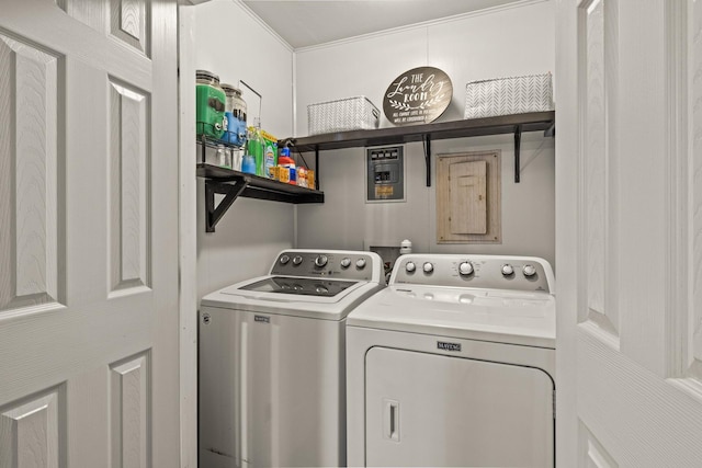 clothes washing area featuring laundry area and washer and dryer