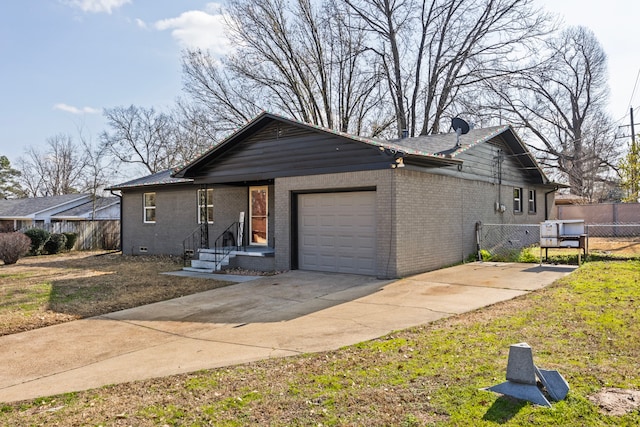 single story home featuring a garage, concrete driveway, crawl space, fence, and brick siding