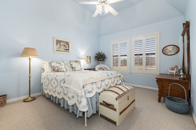 bedroom with light carpet, a ceiling fan, and baseboards