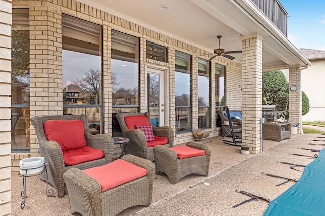 view of patio / terrace featuring a ceiling fan and grilling area