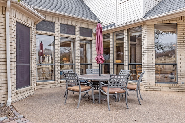 view of patio featuring outdoor dining area