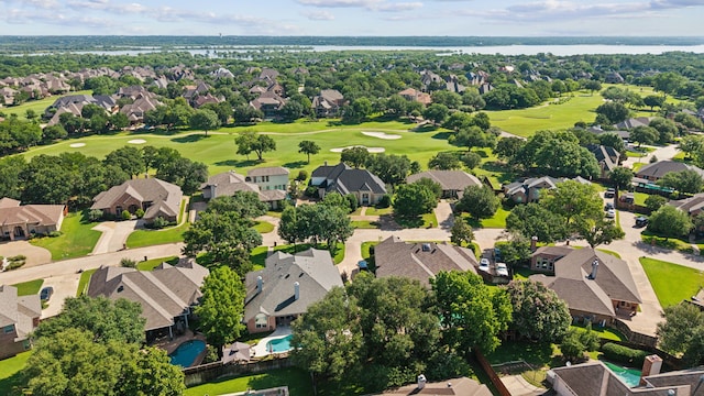 10 Fair Green Dr, Trophy Club, TX 76262 - aerial perspective of suburban area with a golf course, a nearby body of water, and a pool area
