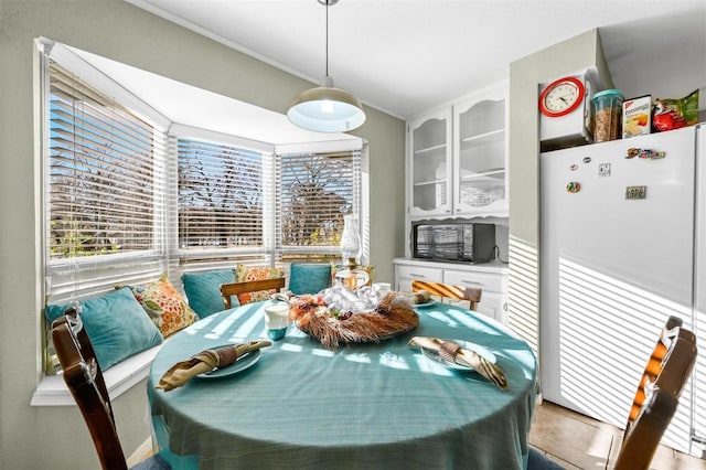 dining space with a healthy amount of sunlight