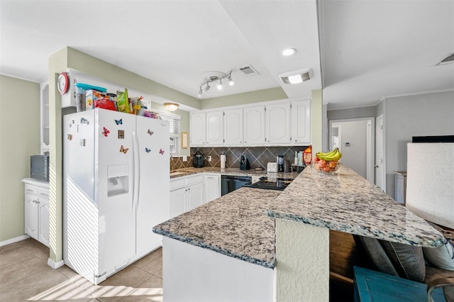 kitchen with light tile patterned floors, white cabinets, black dishwasher, backsplash, and white fridge with ice dispenser