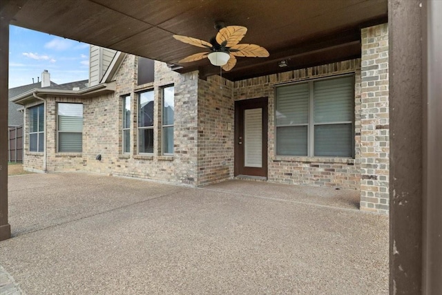 view of patio featuring a ceiling fan