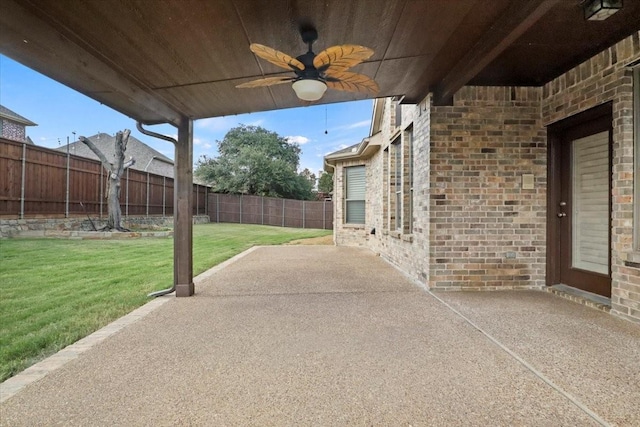 view of patio / terrace featuring fence private yard and ceiling fan