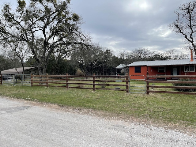 exterior space with a rural view