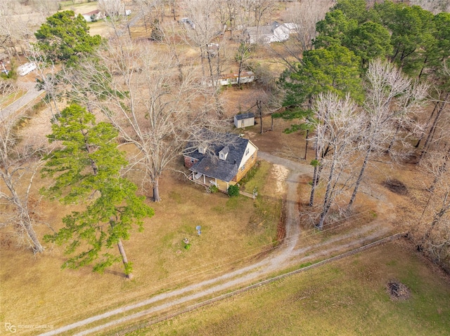 birds eye view of property with a rural view