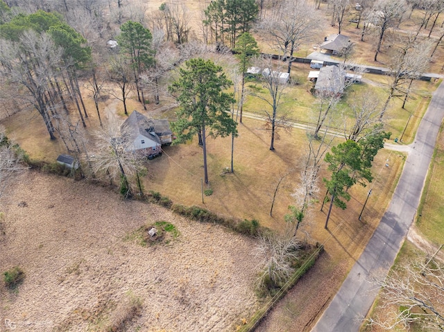 birds eye view of property with a rural view