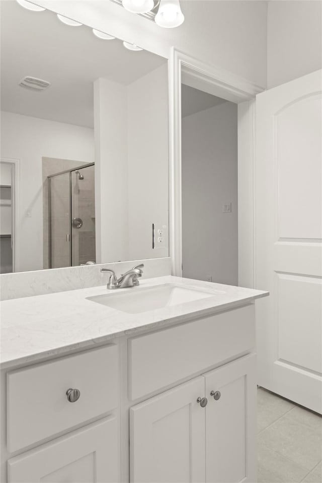279 Bright Alcove Ct, Lavon, TX 75166 - full bath with a shower stall, vanity, and tile patterned flooring