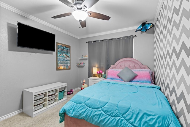 carpeted bedroom featuring ornamental molding, a ceiling fan, and baseboards