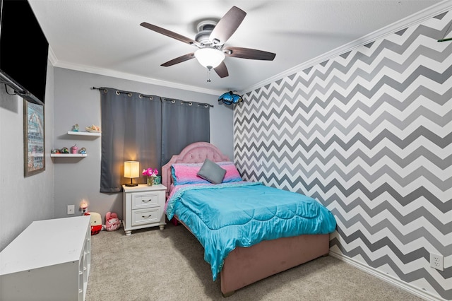 bedroom with an accent wall, light carpet, crown molding, and ceiling fan