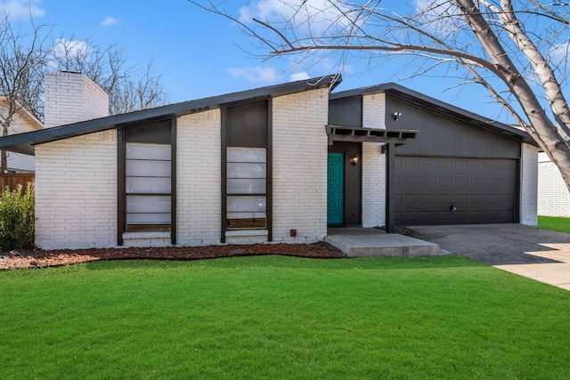 mid-century modern home featuring concrete driveway, a front lawn, and an attached garage