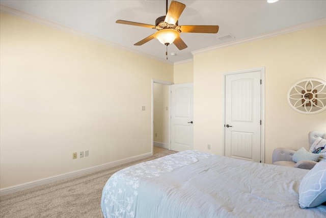 carpeted bedroom featuring ornamental molding, visible vents, baseboards, and a ceiling fan