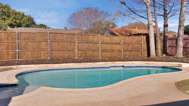 view of swimming pool featuring a fenced in pool and a fenced backyard