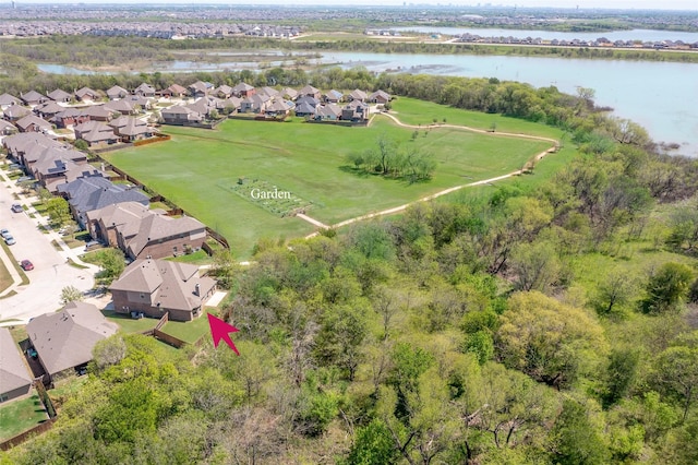 aerial view with a residential view and a water view