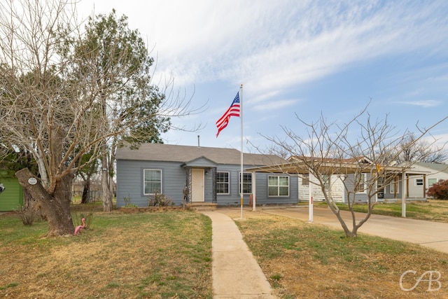 ranch-style house with a front lawn