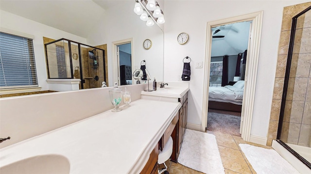 full bath featuring vaulted ceiling, a sink, a shower stall, and ensuite bath