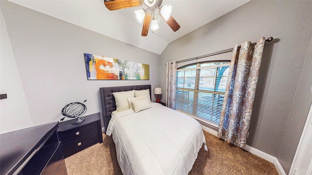 bedroom featuring vaulted ceiling, baseboards, and ceiling fan