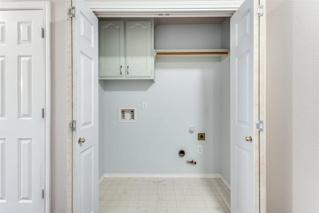 laundry room featuring washer hookup, cabinet space, hookup for an electric dryer, gas dryer hookup, and baseboards