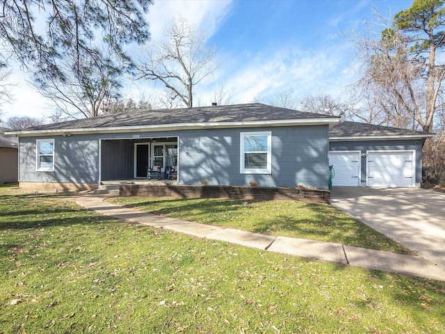 single story home with driveway, a porch, a front lawn, and an attached garage