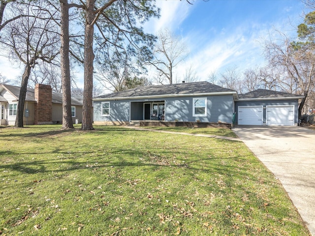 single story home with a garage, driveway, and a front lawn