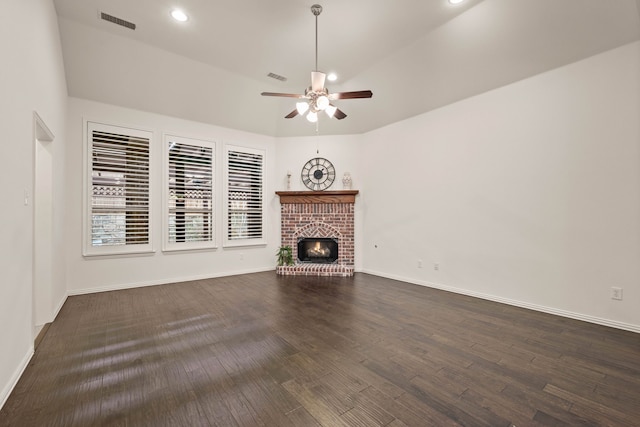 6413 Valley View Dr, Mckinney, TX 75071 - unfurnished living room with visible vents, a fireplace, baseboards, ceiling fan, and dark wood-type flooring