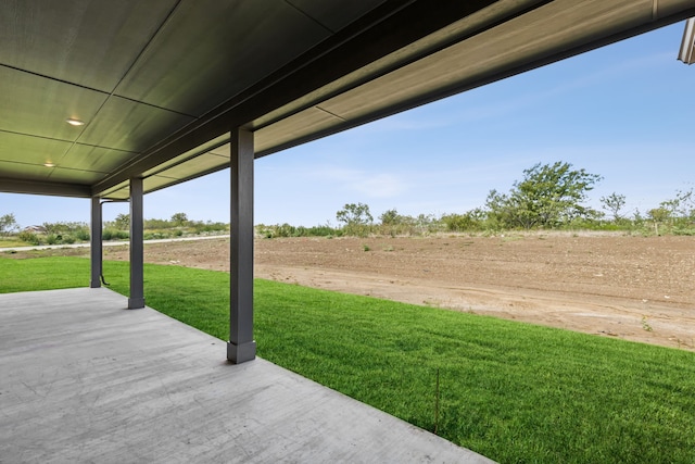 view of patio with a rural view