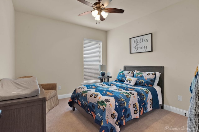 bedroom with ceiling fan, baseboards, and light colored carpet