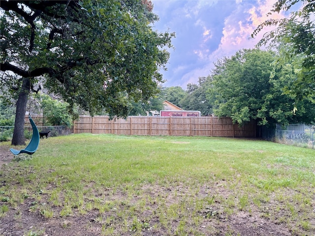 view of yard featuring fence