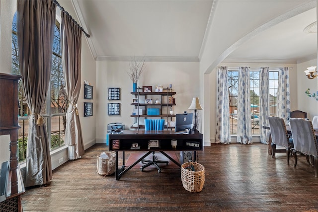 office with an inviting chandelier, baseboards, arched walkways, and ornamental molding