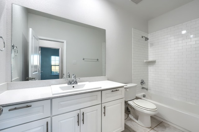 full bathroom featuring visible vents, toilet, tile patterned floors, bathtub / shower combination, and vanity