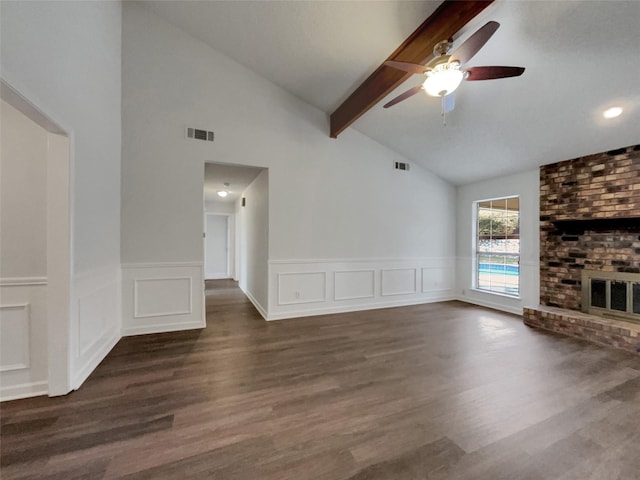 unfurnished living room featuring lofted ceiling with beams, a brick fireplace, visible vents, and wood finished floors