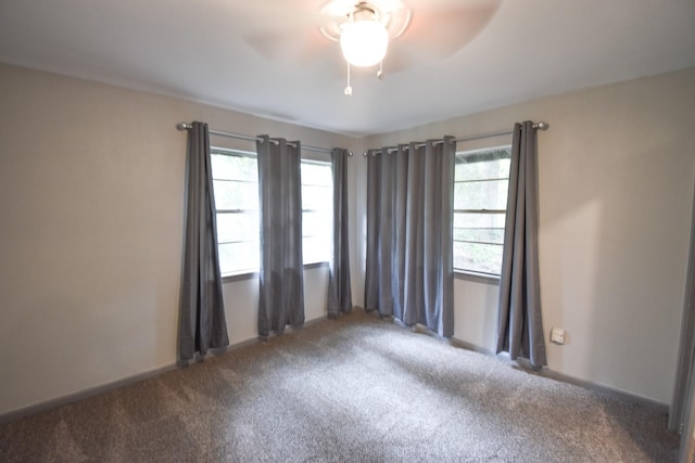 408 Tarrapin, Murchison, TX 75778 - empty room with plenty of natural light, carpet flooring, a ceiling fan, and baseboards