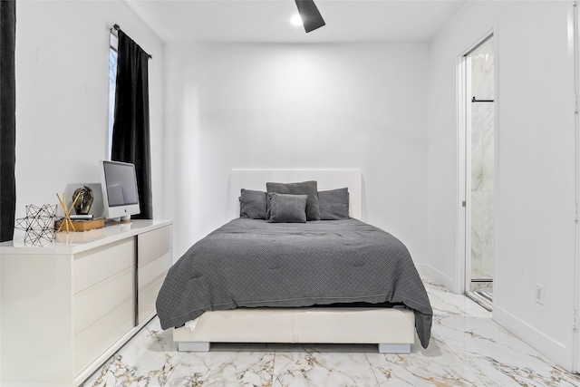 bedroom with ceiling fan, marble finish floor, and baseboards