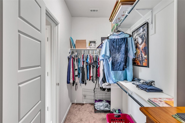 spacious closet with carpet and visible vents