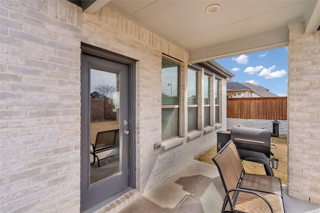 view of patio with fence