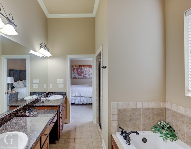 ensuite bathroom with ensuite bath, tile patterned flooring, crown molding, vanity, and a bath