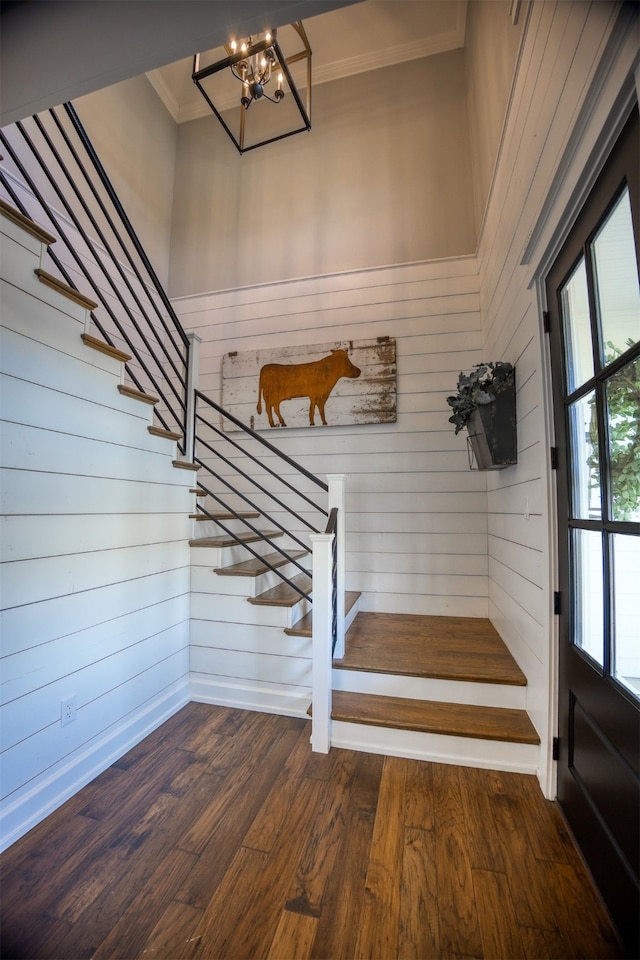 1188 An County Road 103, Elkhart, TX 75839 - mudroom featuring ornamental molding, a chandelier, wood finished floors, and wood walls