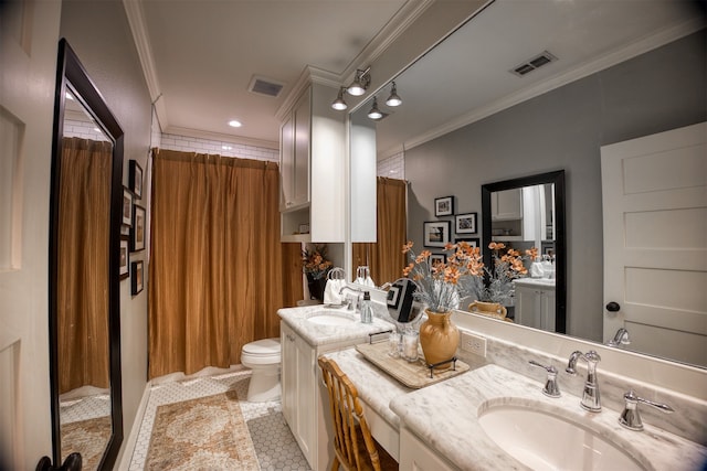 1188 An County Road 103, Elkhart, TX 75839 - full bathroom featuring crown molding, vanity, toilet, and tile patterned floors