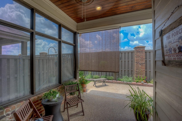 sunroom / solarium with wood ceiling