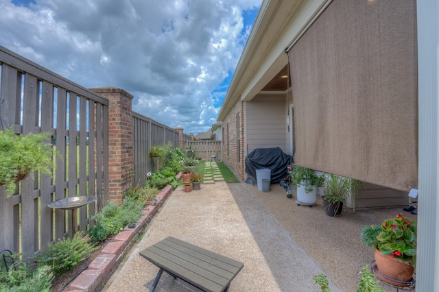 view of patio featuring a fenced backyard