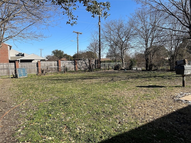 view of yard with fence