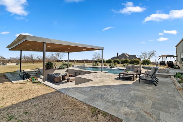 outdoor pool featuring an outdoor hangout area and a patio