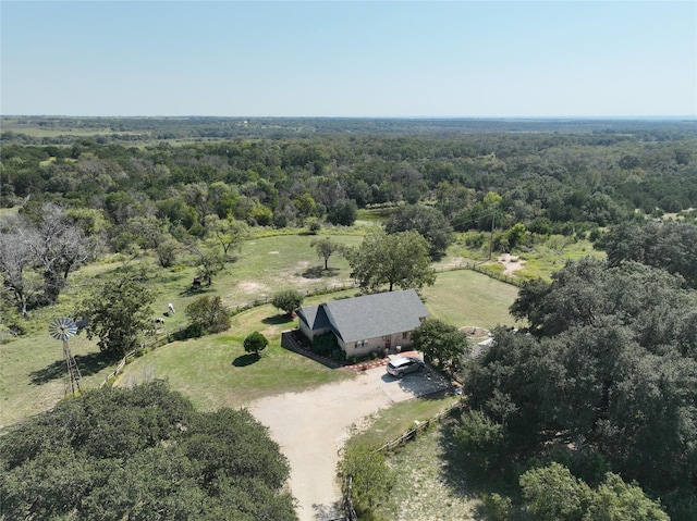 drone / aerial view with a view of trees