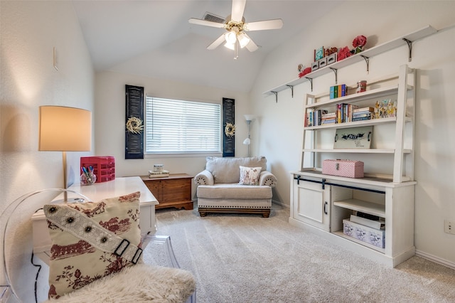 sitting room featuring visible vents, a ceiling fan, carpet, and vaulted ceiling