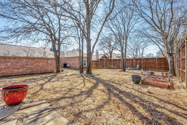 view of yard featuring fence private yard